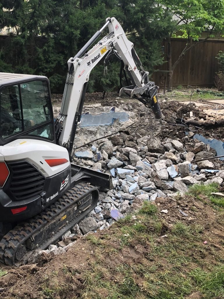 Pool Removal - Breaking Pool Walls