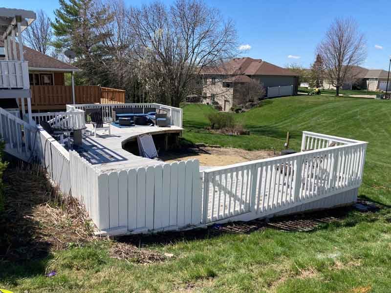 Deck and fence removal in the Quad Cities.
