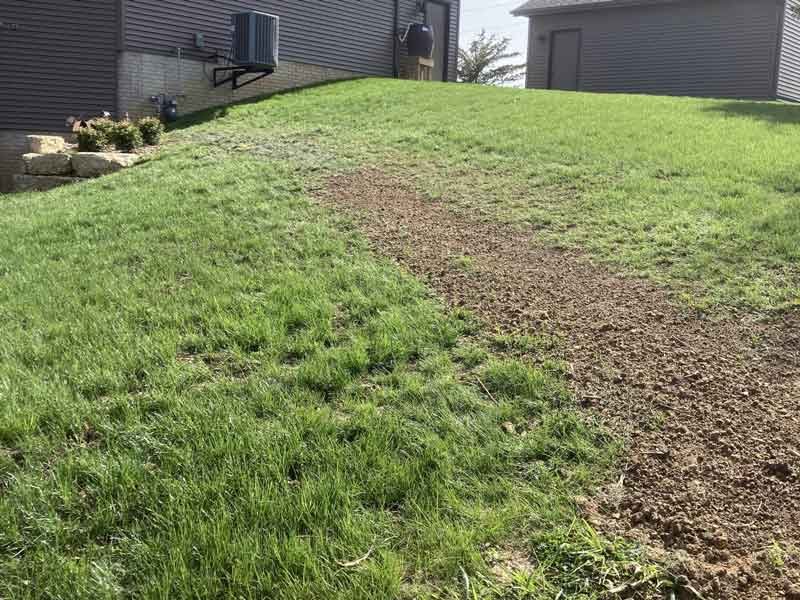 Delta-X install a yard draign or french drain in the Quad Cities - Davenport, Iowa.