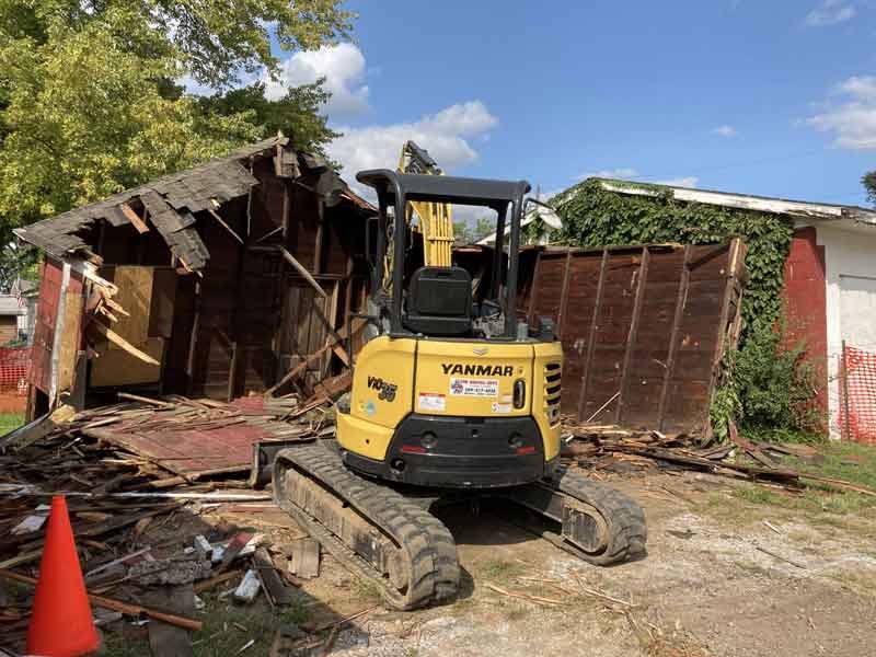 Delta-X LLC demolishing a detached garage in the Quad Cities - Davenport, Iowa.