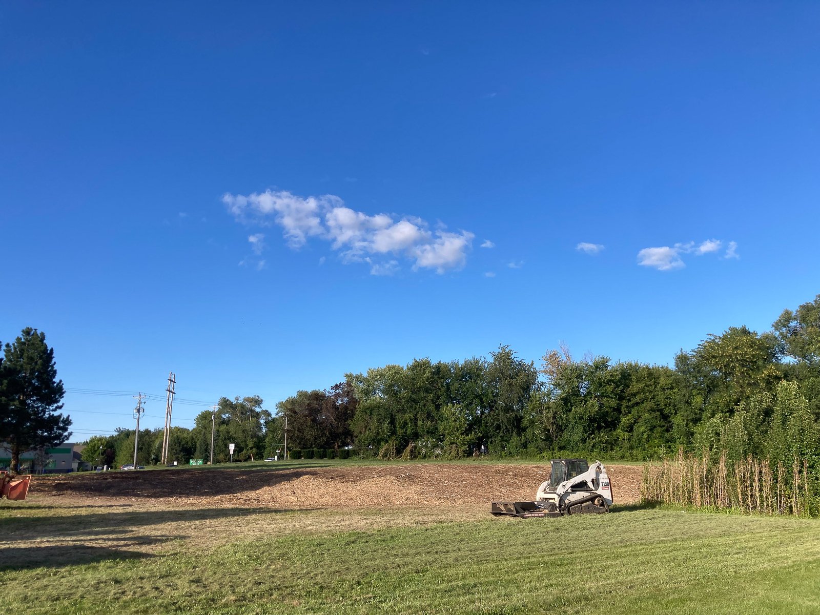 Delta-X burying a sump pump discharge line in a yard in the Quad Cities - Davenport, Iowa.